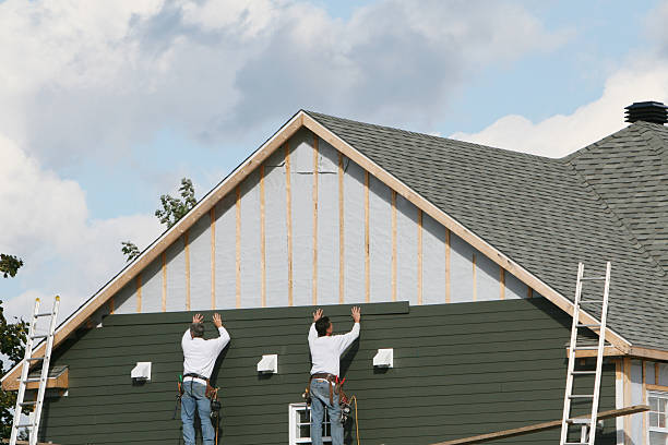 Professional Siding Installation technician working in Rebuck, PA